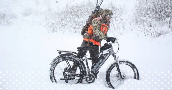 hunter on an eBike in snow