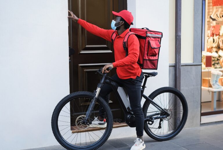Delivery worker on an e-bike