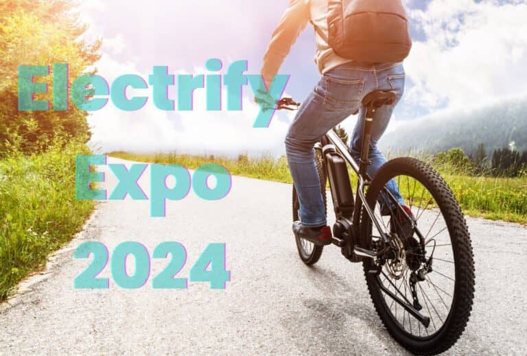 person on electric bike with text saying electrify expo 2024