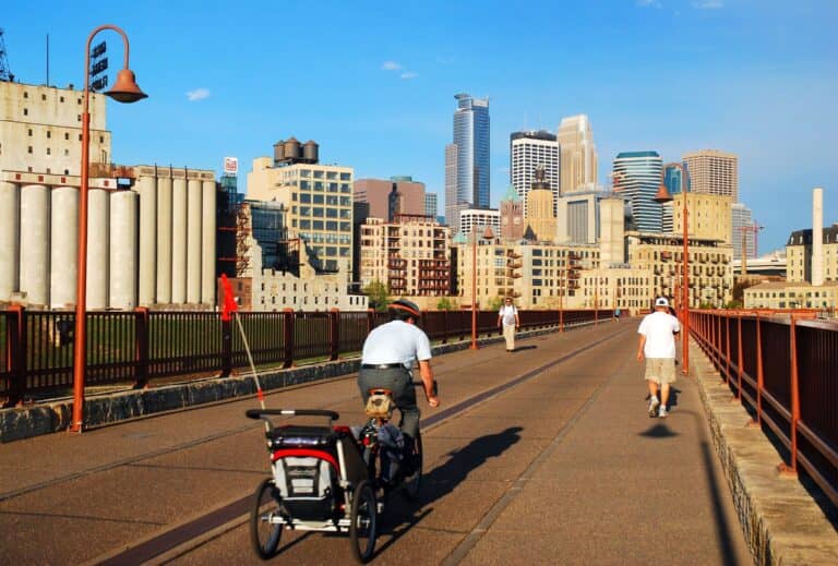 e-bike hauling kid on Minnesota bridge